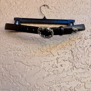 Brighton Black Leather belt with silver accents.  Ladies Size Medium.